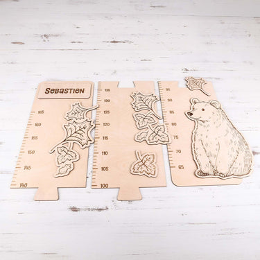 Gyermek mérőszalag a falon – medve